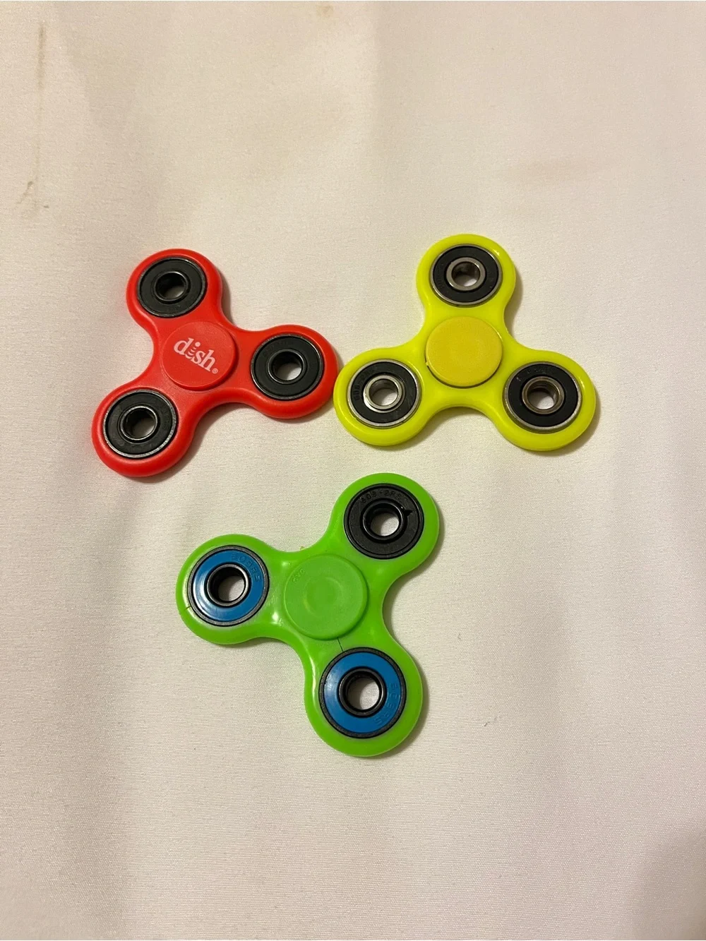 Lot of 3 Fidget Spinners ESPN Dish Network Plastic Toy Red Green Yellow